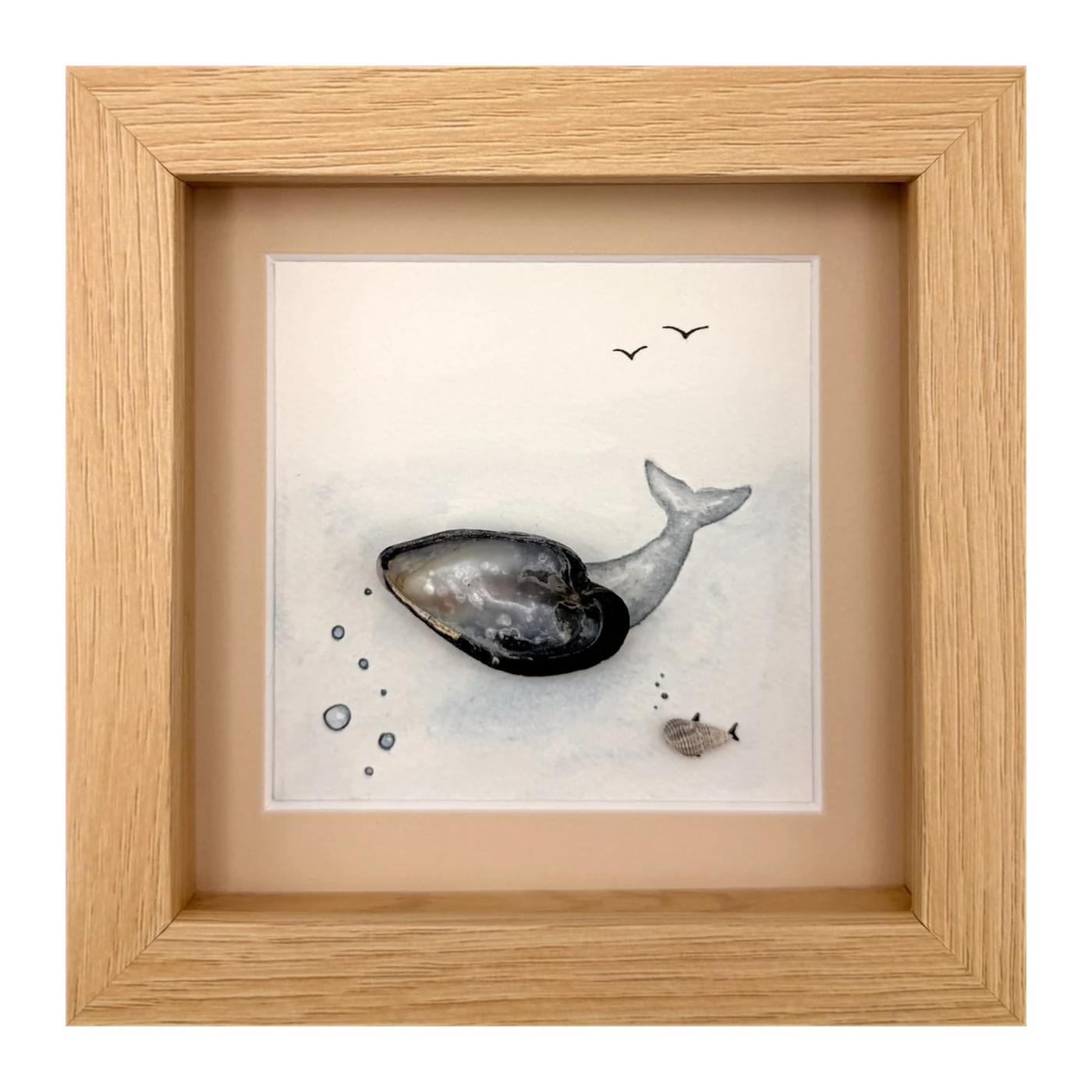 Mussel shell whale with a small fish