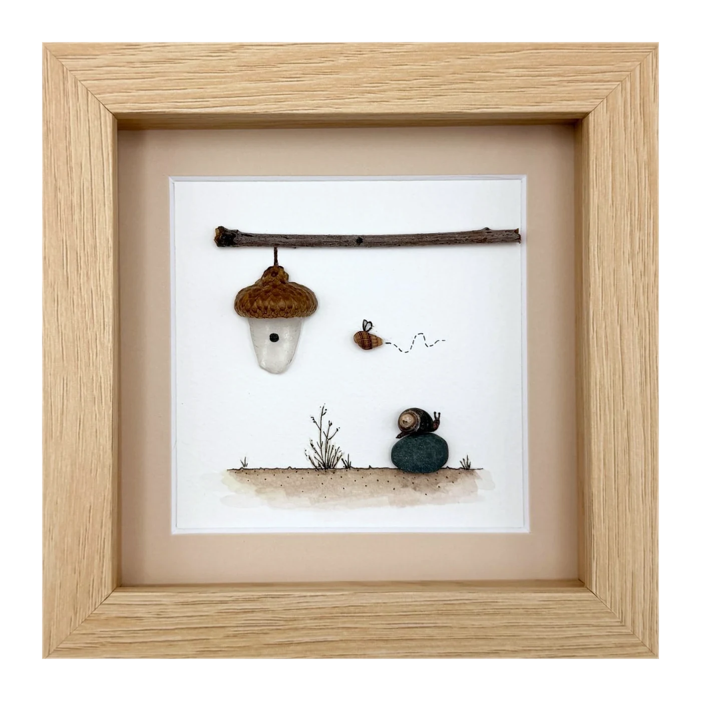 A hanging acorn house with a bee and a snail
