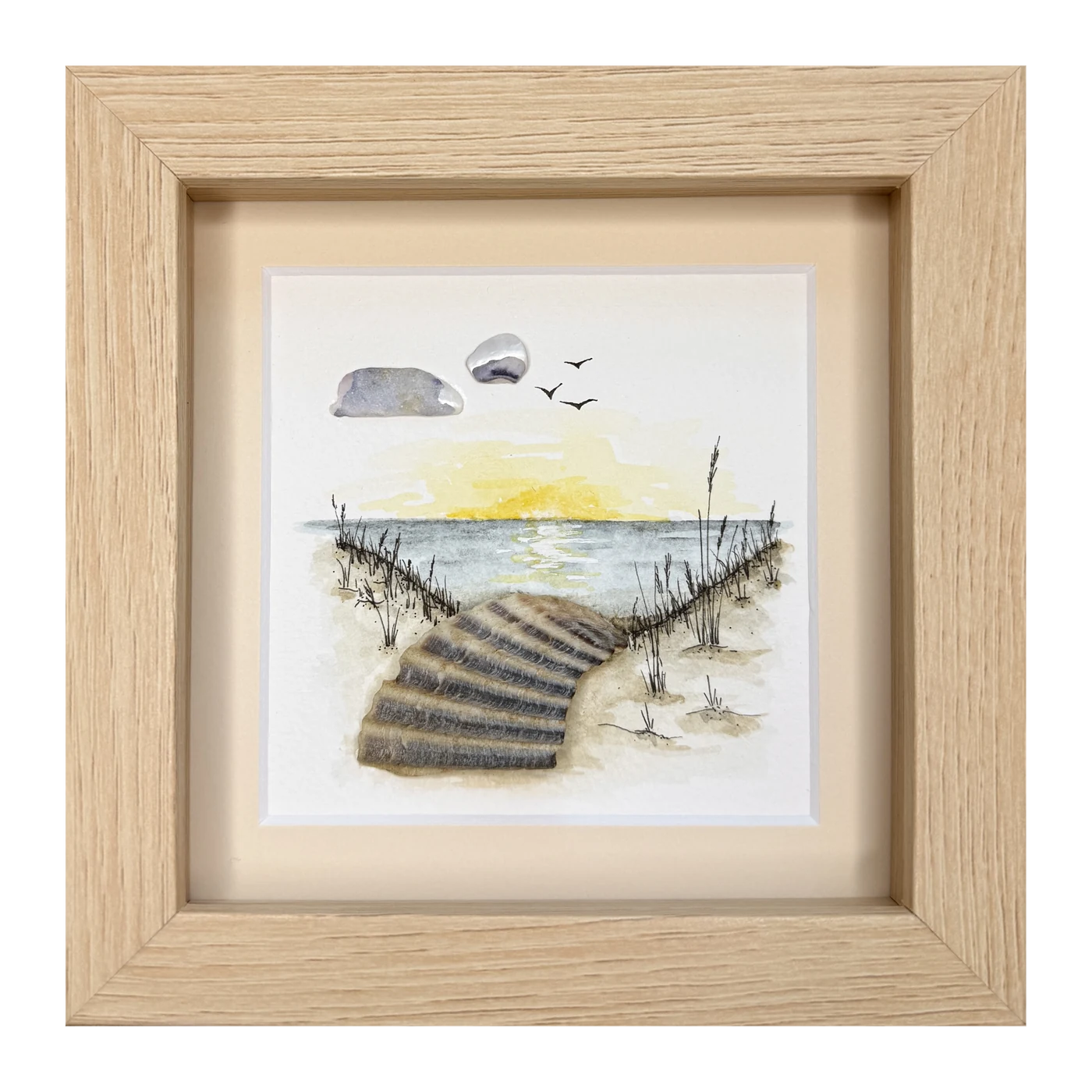 A ribbed shell path through the dunes to the sea at sunset, with shell clouds and three gulls