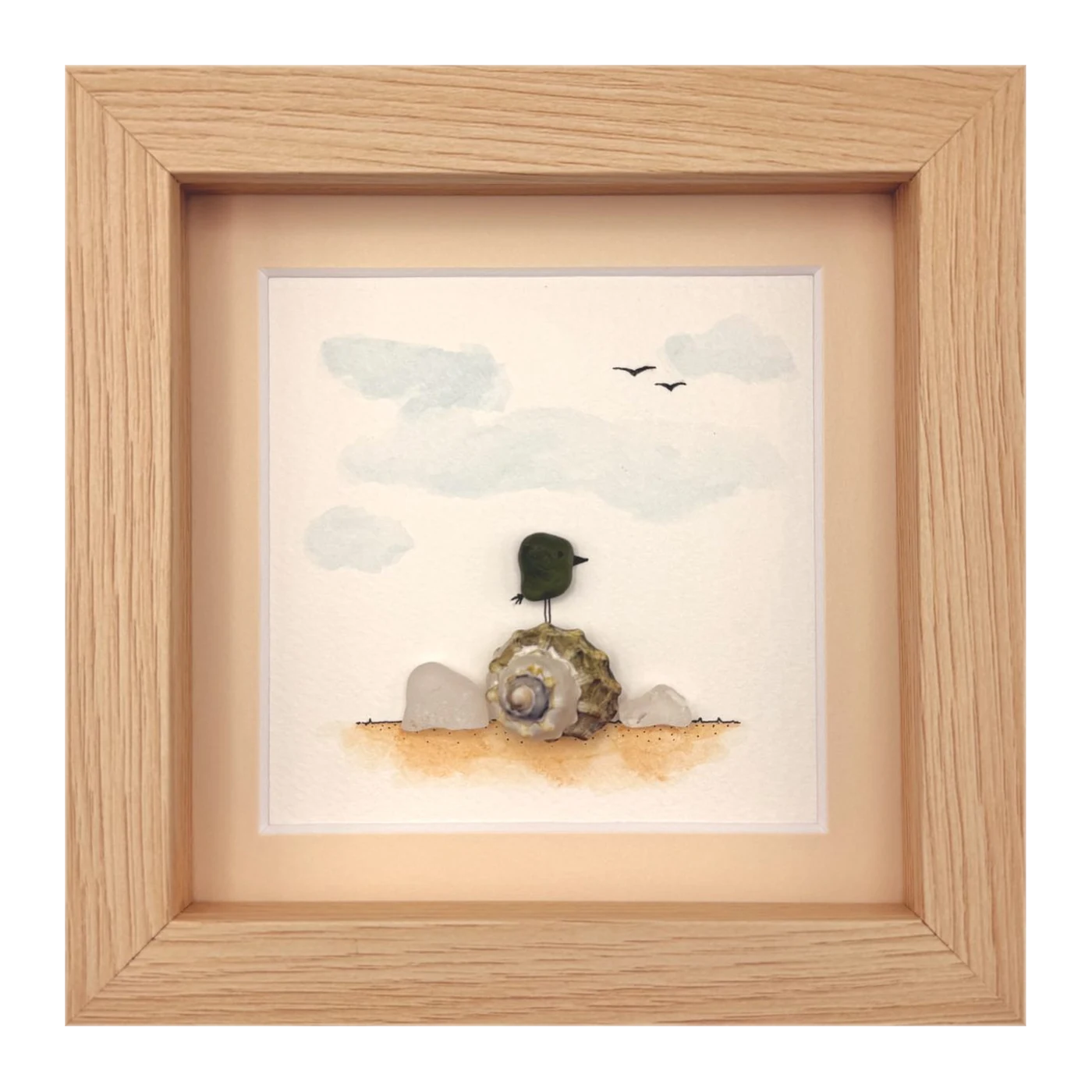 Green sea glass bird on a snail shell